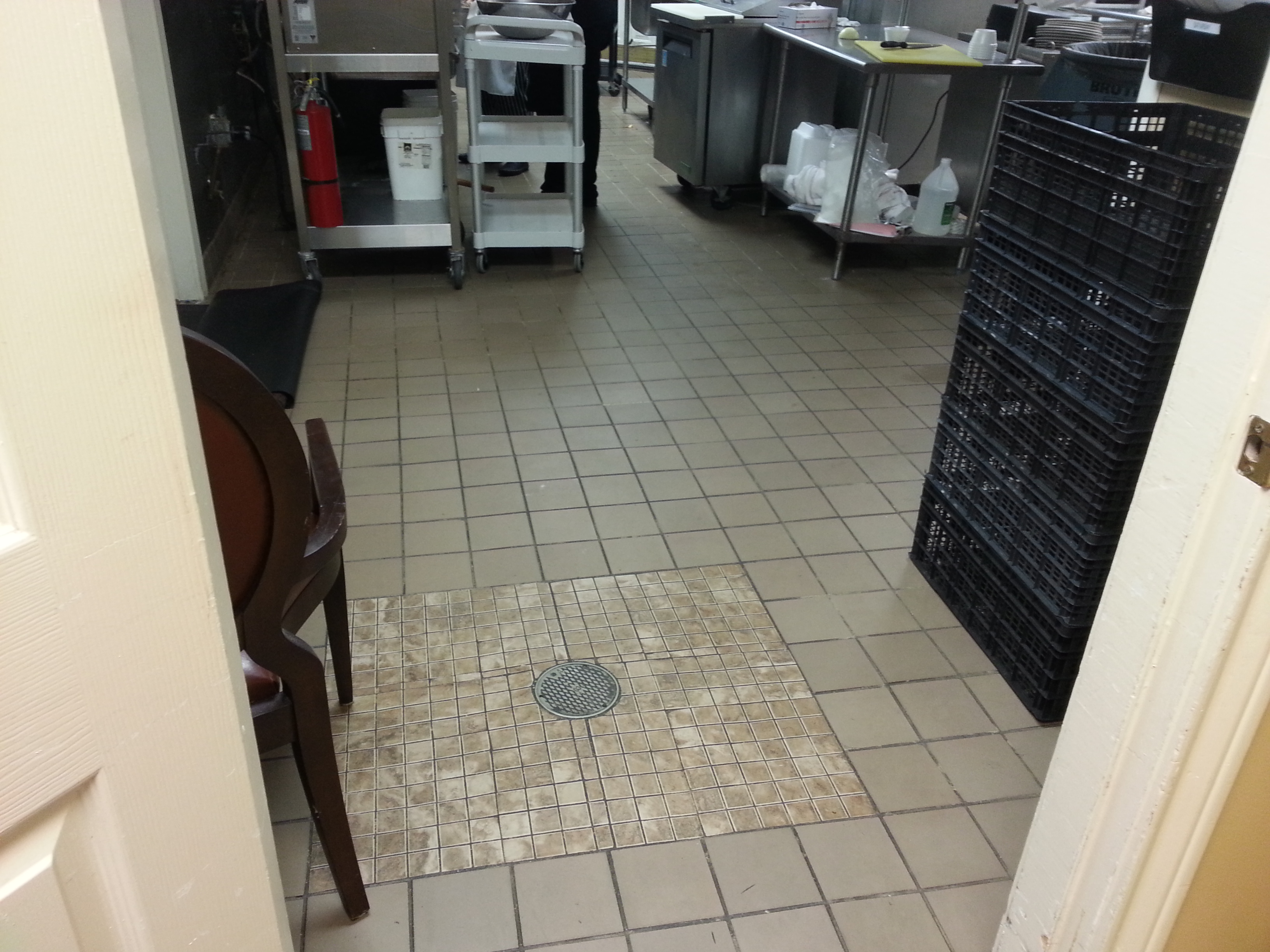 dirty commercial kitchen tile before cleaning